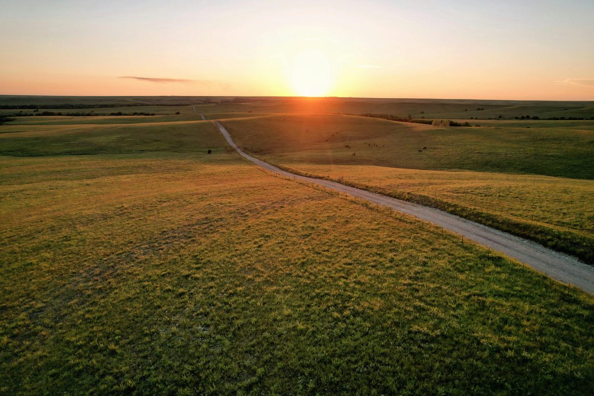 Great Plains road at sunset — the sovereign lands of tribal lenders